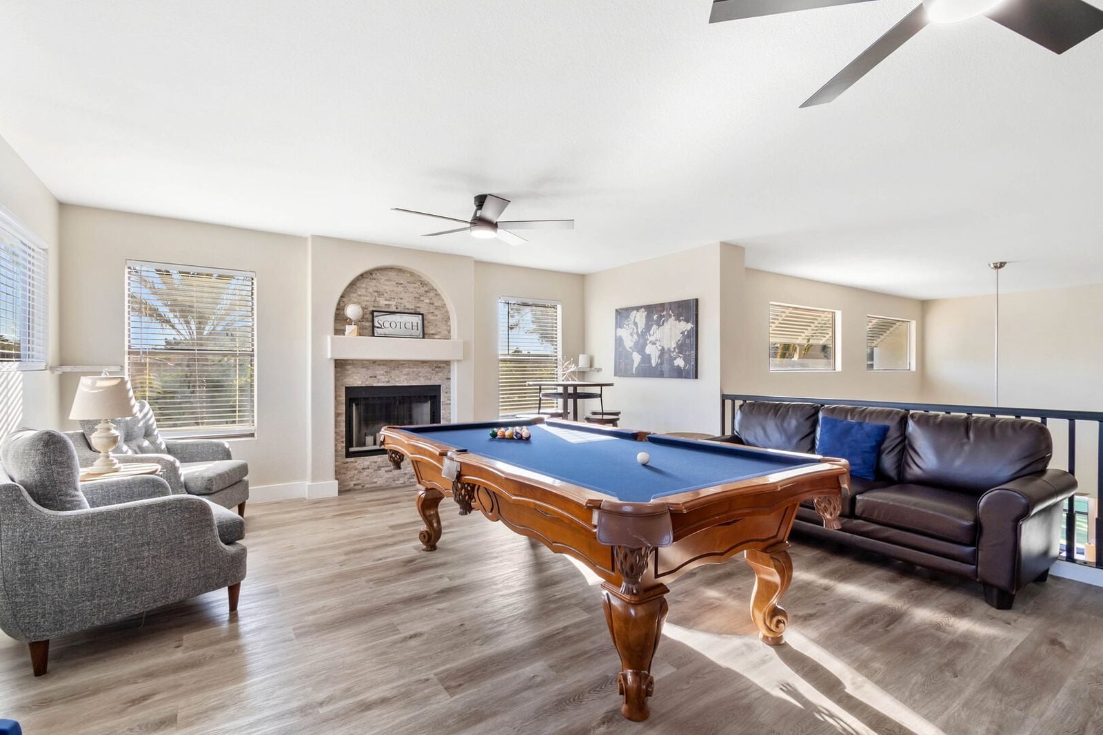 Upstairs loft converted into a game room with pool table